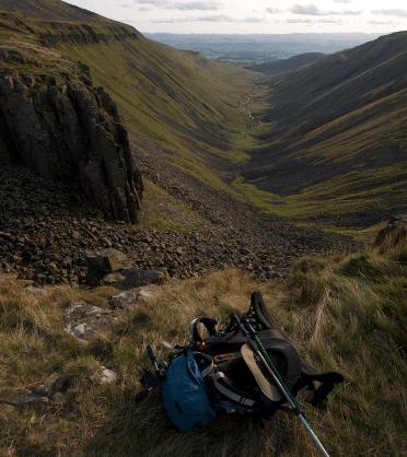 High Cup Nick, a steep-sided glaciated valley on the Pennine Way, in soft golden light in summer.