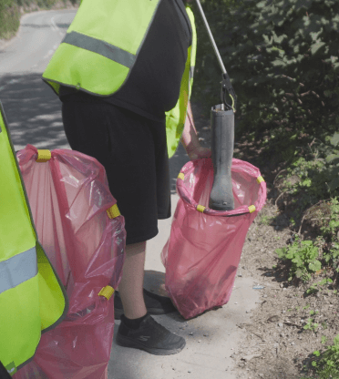 The roadside crew collect an old boot abandoned not far from Contours Holidays HQ.